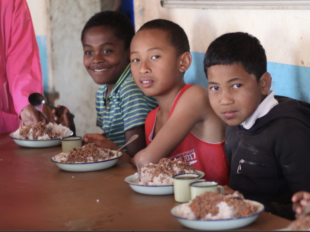 Children receiving healthy sustainable meals as part of MFM's vulnerable children project.